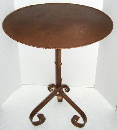 HANDCRAFTED TABLE WITH PATINATED METAL TOP AND ANTIQUE IRON CANDLE STAND BASE