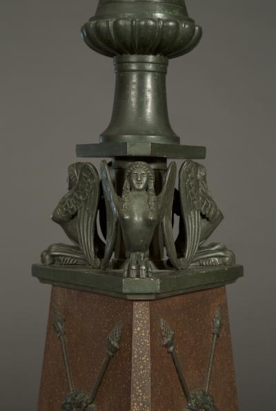 HAREWOOD HOUSE TORCH RES PAIR OF CARVED FAUX BRONZE AND FAUX PORPHYRY TORCH RES