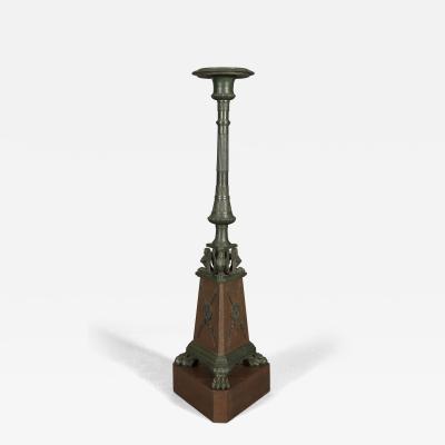 HAREWOOD HOUSE TORCH RES PAIR OF CARVED FAUX BRONZE AND FAUX PORPHYRY TORCH RES