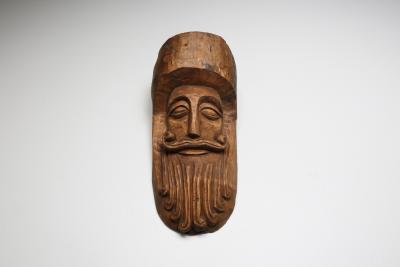Hand Carved Rustic Wooden Mask with soft expression 1900s