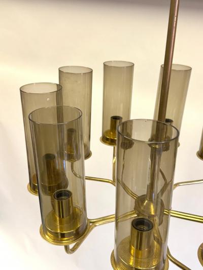Hans Agne Jakobsson 2 Scandinavian Modern Brass Smoked Glass Chandeliers by Hans Agne Jakobsson