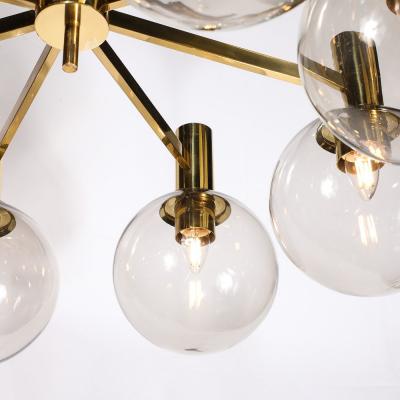 Hans Agne Jakobsson Mid Century Modernist 8 Globe Polished Brass Chandelier by Hans Agne Jakobsson