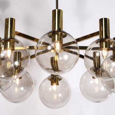 Hans Agne Jakobsson Mid Century Modernist 8 Globe Polished Brass Chandelier by Hans Agne Jakobsson