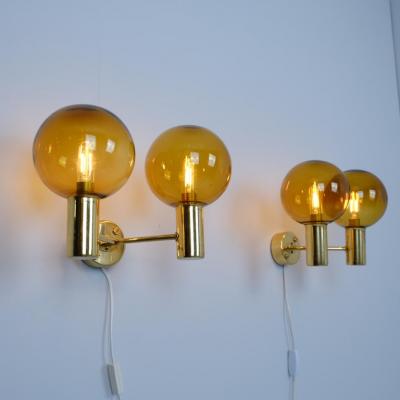 Hans Agne Jakobsson Pair of Hans Agne Jakobsson Brass Scones Model V 149 2 Amber Glass 1950s