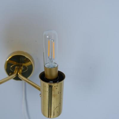 Hans Agne Jakobsson Pair of Hans Agne Jakobsson Brass Scones Model V 149 2 Amber Glass 1950s