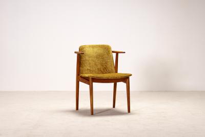 Hans Olsen Elegant Hans Olsen Teak and Oak armchair Circa 1960 