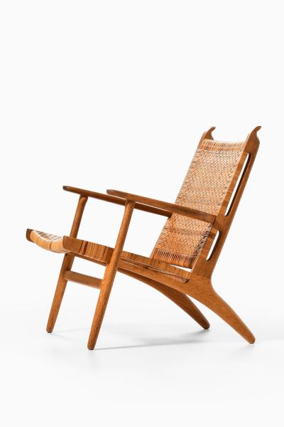 Hans Wegner Easy Chair in Cane and Oak by Hans Wegner 1949