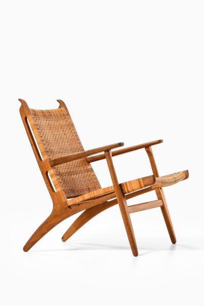 Hans Wegner Easy Chair in Cane and Oak by Hans Wegner 1949