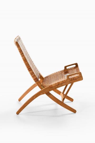 Hans Wegner Folding Easy Chair in Cane and Oak by Hans Wegner 1949