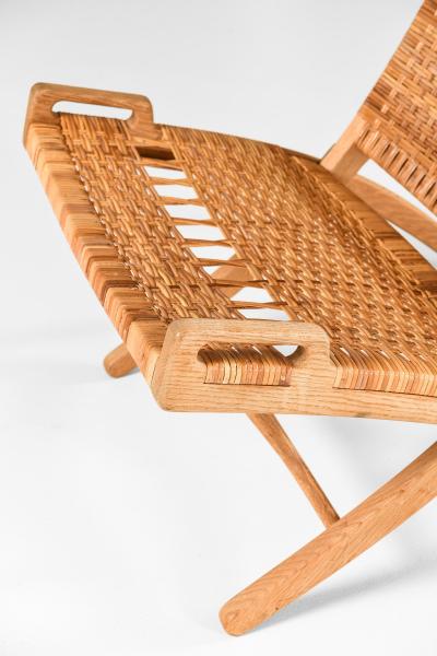 Hans Wegner Folding Easy Chair in Cane and Oak by Hans Wegner 1949