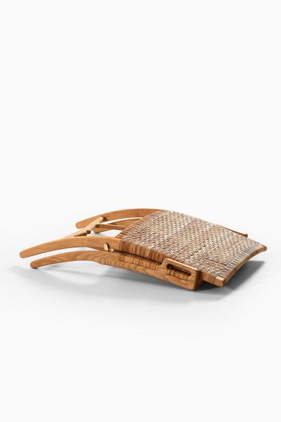 Hans Wegner Folding Easy Chair in Cane and Oak by Hans Wegner 1949
