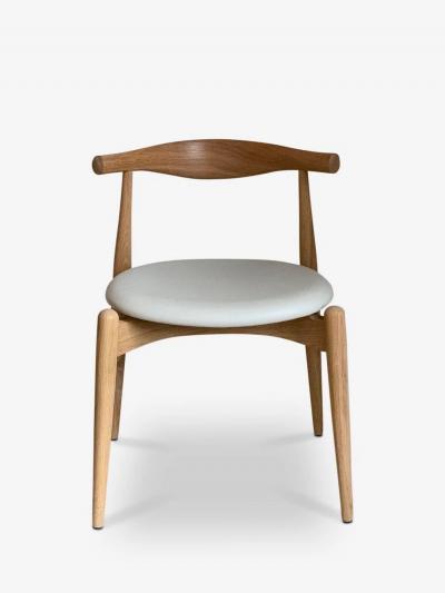 Hans Wegner HANS WEGNER ELBOW CHAIR IN SOAPED OAK