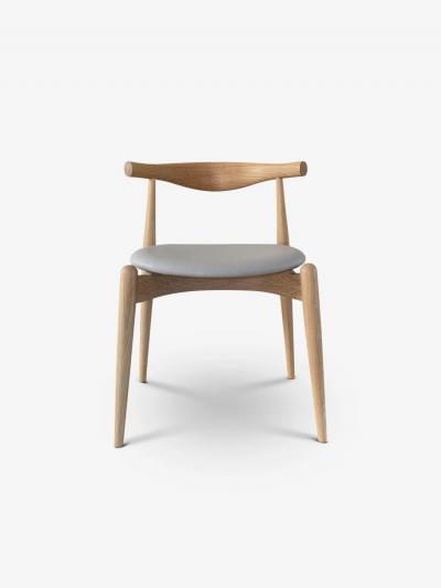 Hans Wegner HANS WEGNER ELBOW CHAIR IN SOAPED OAK