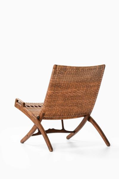 Hans Wegner JH 512 Folding Chair in Cane and Oak by Hans Wegner 1950