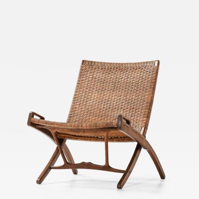 Hans Wegner JH 512 Folding Chair in Cane and Oak by Hans Wegner 1950