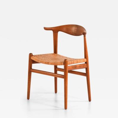 Hans Wegner Scandinavian Modern JH 505 Cowhorn Chair in Teak and Cane by Hans Wegner 1952
