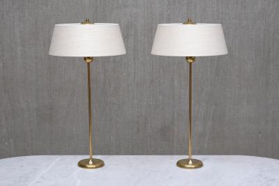 Harald Notini Pair of Tall Brass Table Lamps by Harald Notini for B hlmarks Sweden 1950s