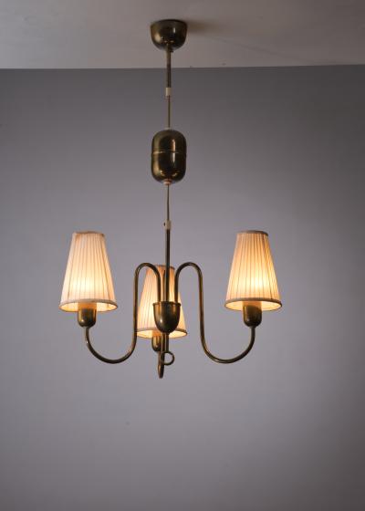 Height adjustable brass chandelier