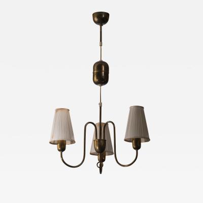 Height adjustable brass chandelier