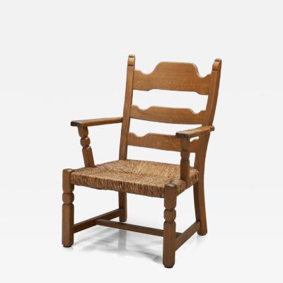 Henning Kjaernulf Armchair with Woven Seating in the manner of Henning Kj rnulf Denmark 1960s