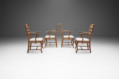 Henning Kjaernulf Henning Kj rnulf Set of Four Oak Dining Chairs Denmark 1960s