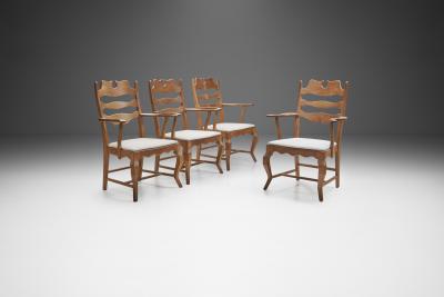 Henning Kjaernulf Henning Kj rnulf Set of Four Oak Dining Chairs Denmark 1960s