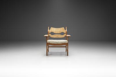 Henning Kjaernulf Henning Kjaernulf Razorblade Armchair with Sheepskin Denmark 1960s
