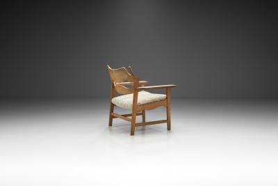Henning Kjaernulf Henning Kjaernulf Razorblade Armchair with Sheepskin Denmark 1960s