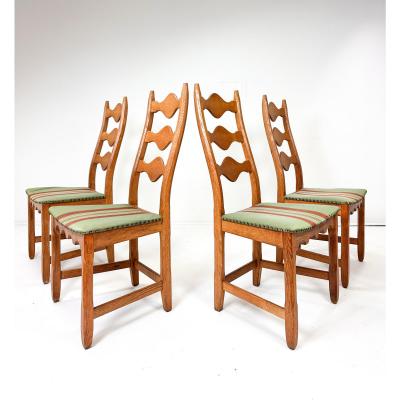 Henning Kjaernulf Set of Four Dining Chairs by Henning Kjaernulf