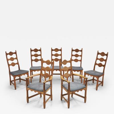 Henning Kjaernulf Set of Seven Oak Dining Chairs by Henning Kj rnulf Denmark 1960s