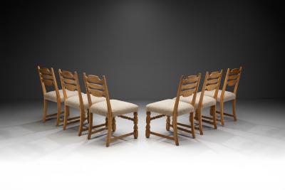 Henning Kjaernulf Six Solid Oak Dining Chairs in the Manner of Henning Kj rnulf Denmark 1960s