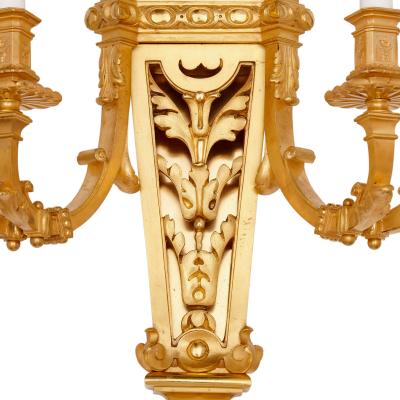 Henri Picard Set of four Baroque style gilt bronze wall lights by Picard