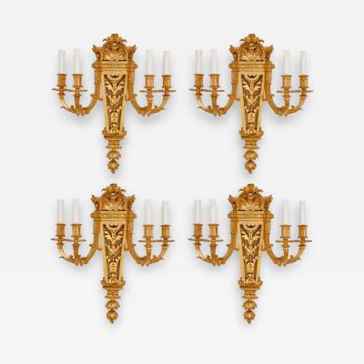 Henri Picard Set of four Baroque style gilt bronze wall lights by Picard