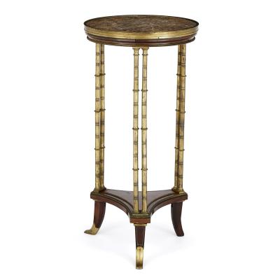 Henry Dasson Gilt bronze mounted mahogany round table by Henry Dasson