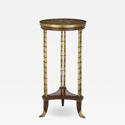 Henry Dasson Gilt bronze mounted mahogany round table by Henry Dasson