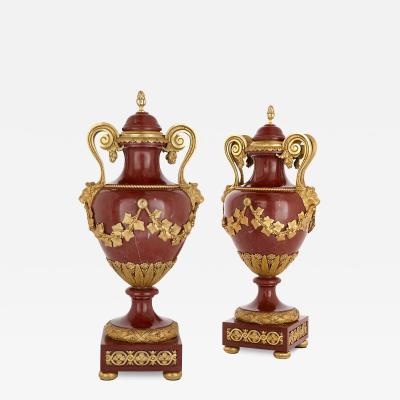 Henry Dasson Pair of French marble and gilt bronze vases by Henry Dasson