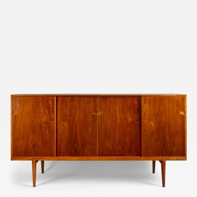 Henry Rosengren Hansen Big sideboard with sliding doors by Henry Rosengren Hansen Denmark 1960s