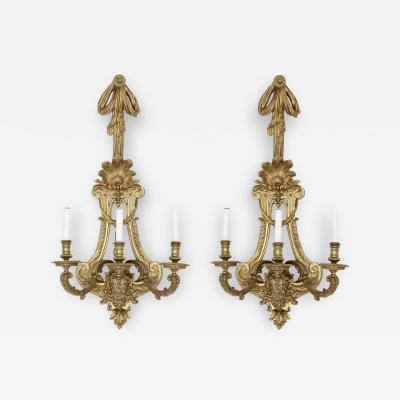 Henry Vian Two large French ormolu three branch wall sconces by H Vian