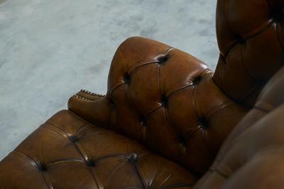 Highly Original Tufted English Wingback Settee in Patinated Leather 1900