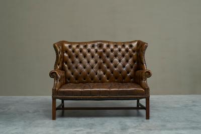 Highly Original Tufted English Wingback Settee in Patinated Leather 1900