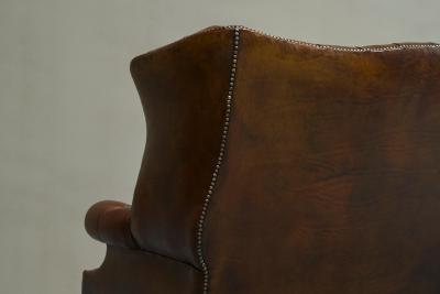 Highly Original Tufted English Wingback Settee in Patinated Leather 1900