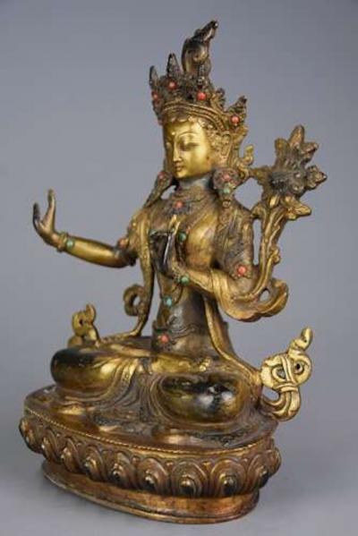 Highly decorative Chinese gilt metal Buddha