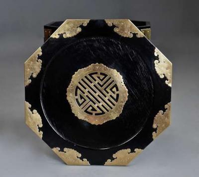Highly decorative Oriental ebonised brass octagonal table