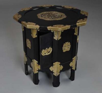 Highly decorative Oriental ebonised brass octagonal table