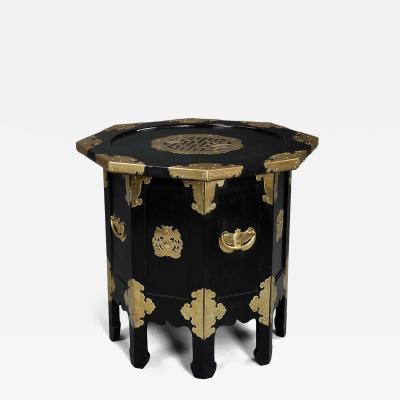 Highly decorative Oriental ebonised brass octagonal table