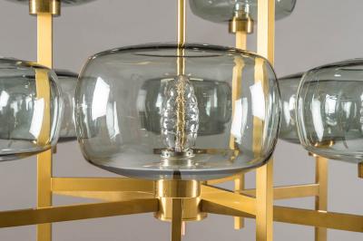 Holger Johansson Five Swedish Chandeliers in Brass and Glass by Holger Johansson