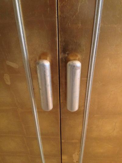 Hollywood Regency Gold and Silver Leaf Cabinet