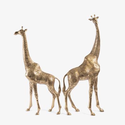 Hollywood Regency Style Polished Brass Giraffe Sculptures Pair