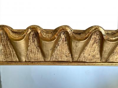 Hollywood regency gilded rectangular mirror with undulating ruffled frame