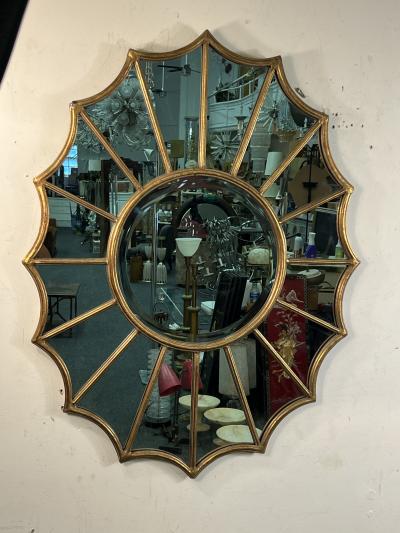 ITALIAN GILDED RESIN AND METAL FRAMED STARBURST MIRROR
